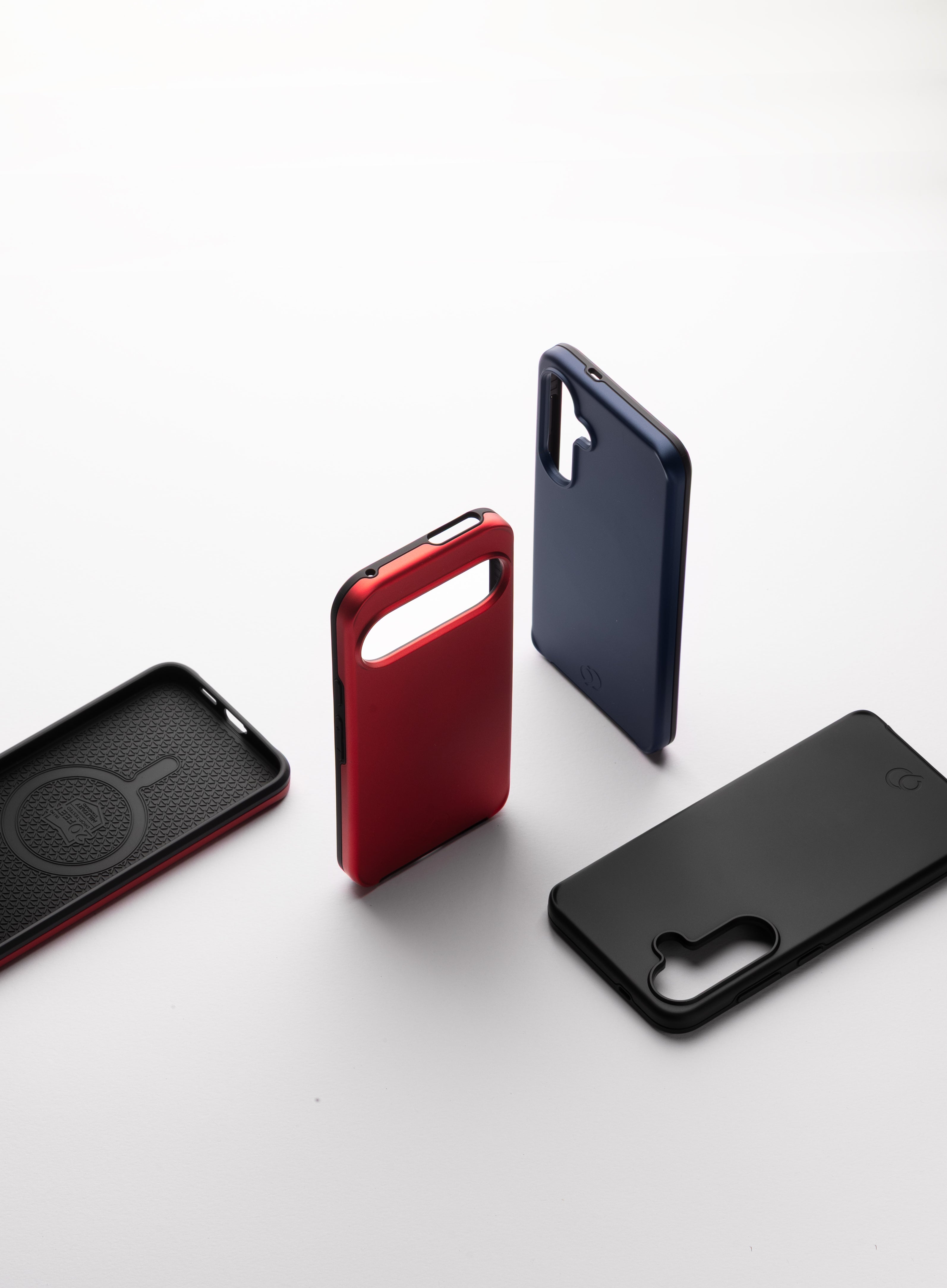 Nimbus9 Cirrus 3 cases for Galaxy and Pixel—black, red, and navy standing on white.
