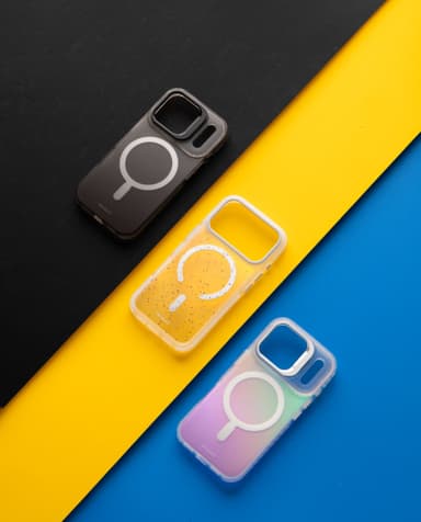Three empty Stratus 2 shells arranged diagonally on a black, yellow and blue backdrop