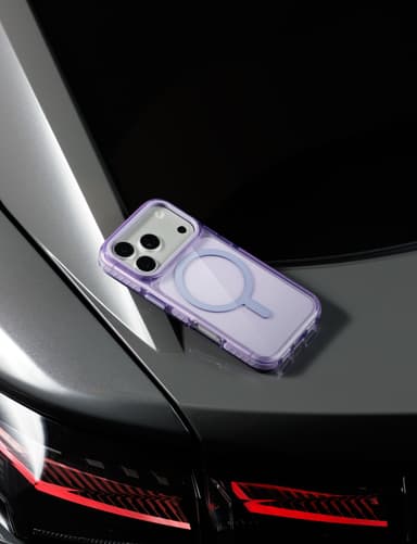 Nimbus9 Phantom 3 case on a car hood at dusk, taillights glowing behind it