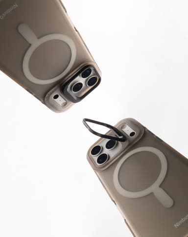 Two Stratus 2 cases in Smoke at opposing diagonals on white, each on a titanium iPhone, the lower one with its kickstand ring flipped open